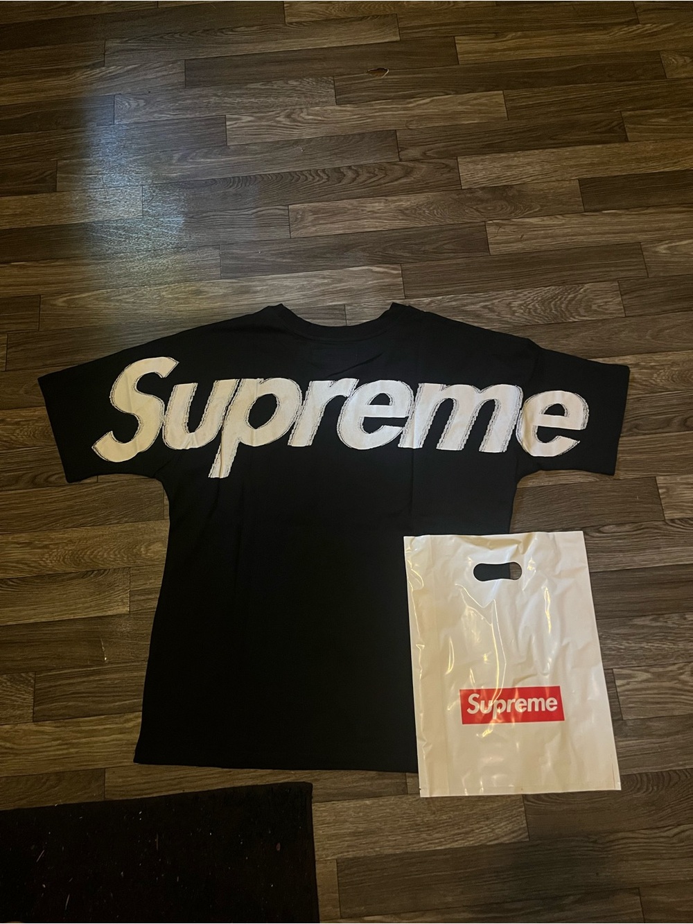 Supreme Black Tee with Large White Script Logo